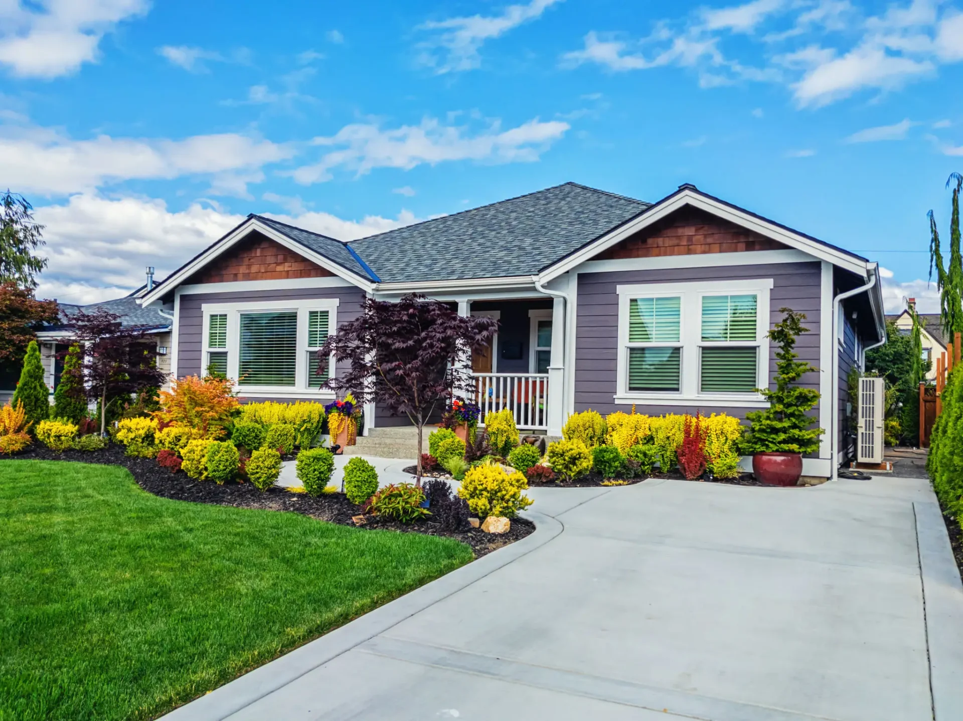 Modern suburban house with landscaped yard